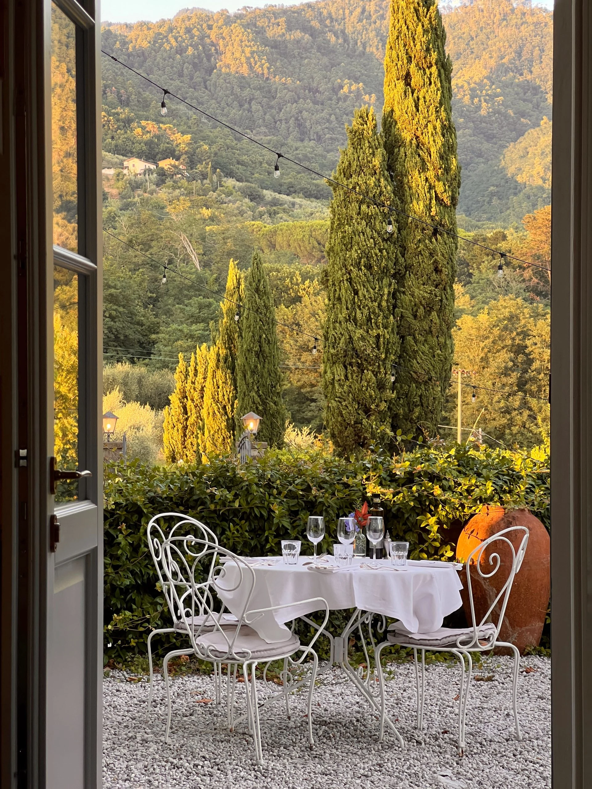 A terrace overlooking cypress trees in Tuscany