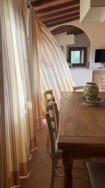 Curtains in the afternoon breeze